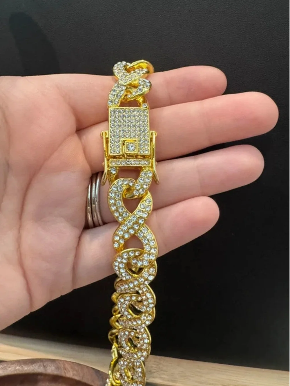 22” gold tone infinity chain, iced out